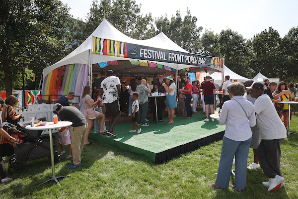 Guests enjoying the festival front porch area